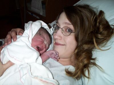 Mommy holding me (crying)