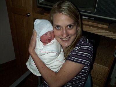Aunt Sue holding me for the first time