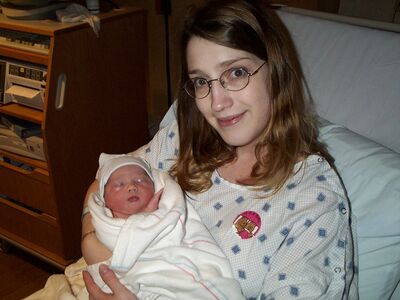 Mommy holding me at the hospital