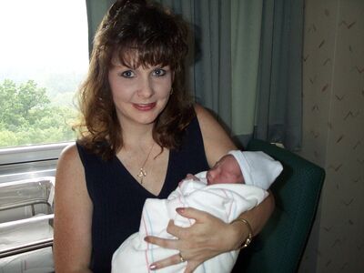 Aunt Tuni holding me for the first time