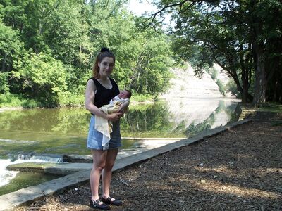 Mommy holding me in the metropark