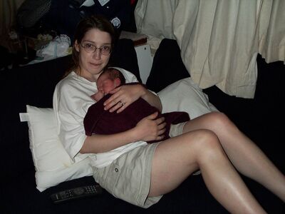 Mommy holding me at the boat