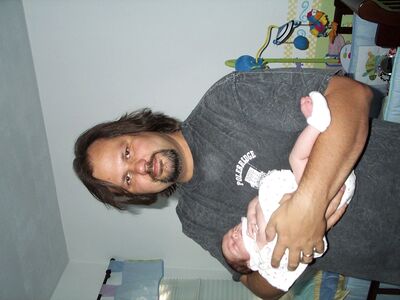 Daddy holding me