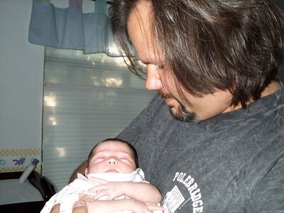 Daddy holding me