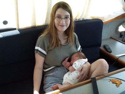 Mommy holding me while I sleep