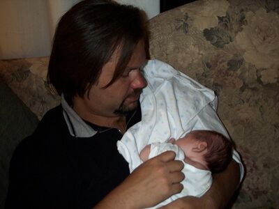 Daddy holding me