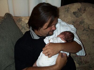 Daddy holding me