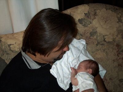 Daddy holding me