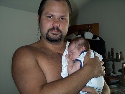 Daddy holding me