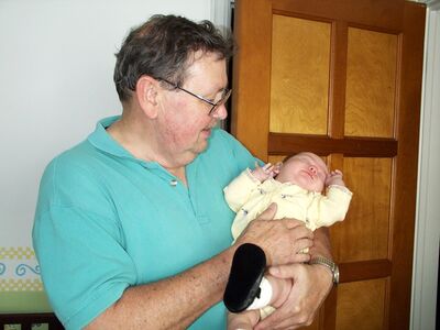 Grandpa Bill holding me…shoe shot