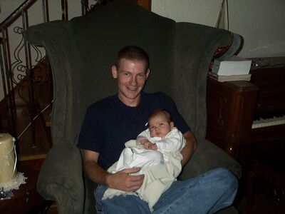 Tim holding me