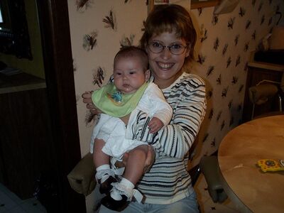 Aunt Anita holding me