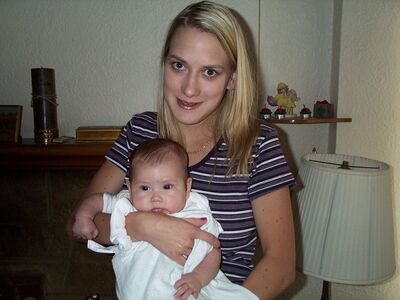Aunt Sue holding me