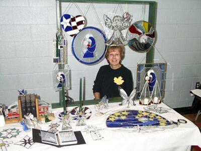 Grandma Bev at the stained glass table