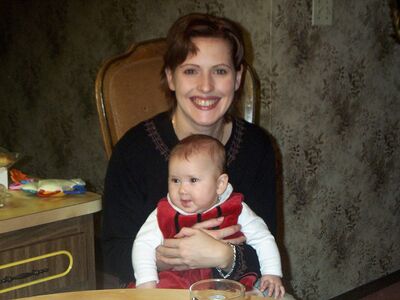 Aunt Anita holding me