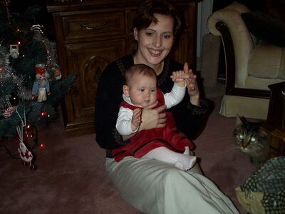 Aunt Anita holding me