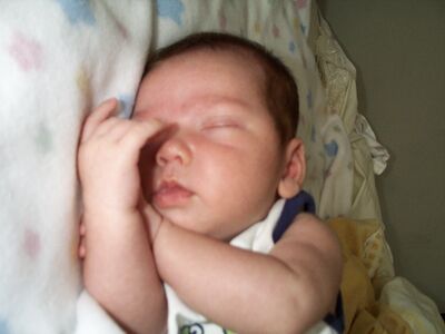 Me asleep in the frog outfit