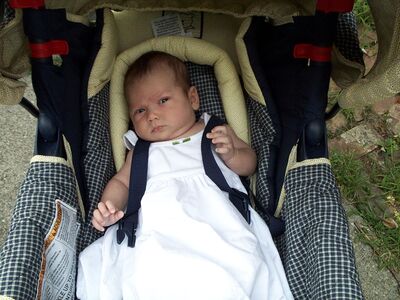 Me in white dress in carseat