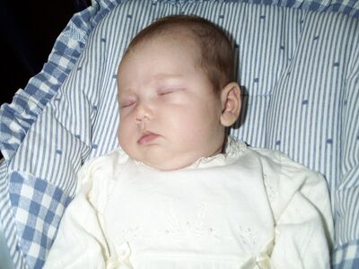 Me sleeping in the swing