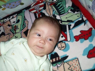Me in the green duckie onesie