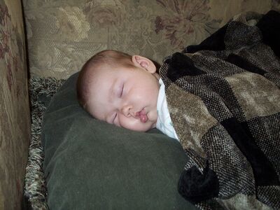 Me asleep on the couch (cute!)