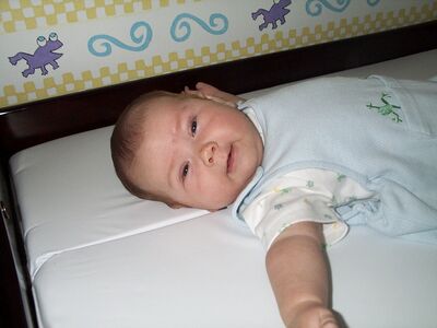 Me in my frog outfit almost smiling