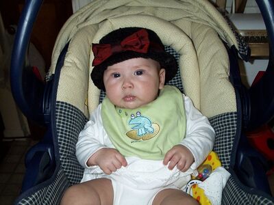 Me in frog bib and hat
