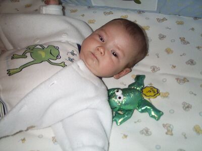 Me in frog outfit (Mom was on a pic taking kick)
