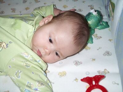 Me in green frog outfit closeup