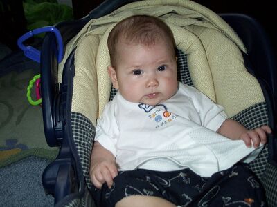 Me in carseat with Aunt Anita's whale shirt on