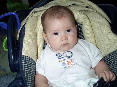 Me in carseat with Aunt Anita's whale shirt on