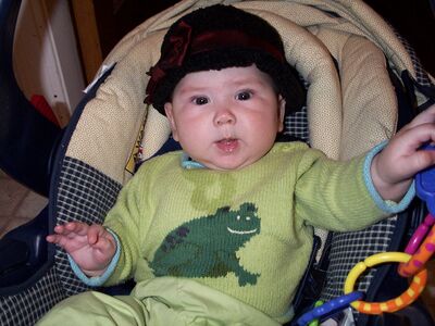 Me in frog sweater and hat