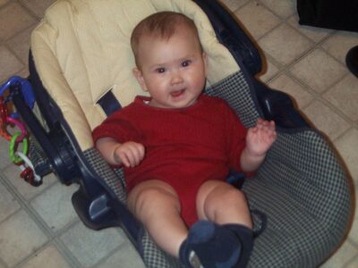 Me in red onesie limlim face
