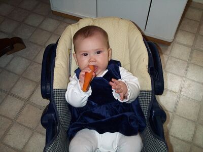 Me in blue velvet dress with carrot