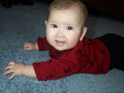 Me in red sweater smiling