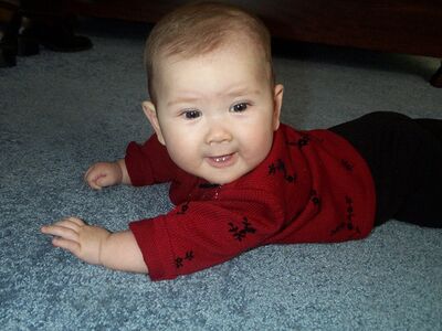 Me in red sweater smiling