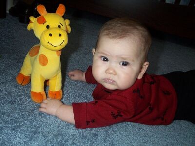 Me in red sweater with giraffe (Daddy's favorite)