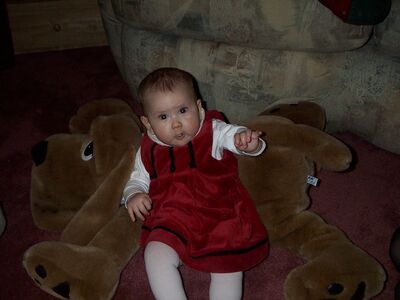 Me resting on dog stuffed animal