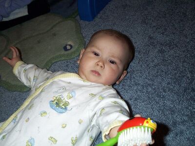 Me in an ooh-frog outfit with brush