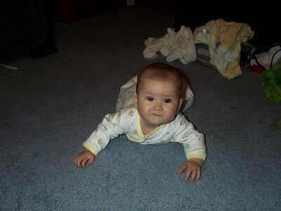 Me in an ooh-frog outfit crawling