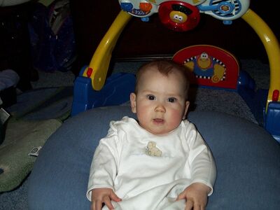 Me in the white puppy outfit smiling