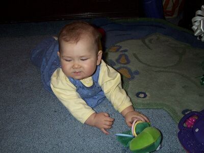 Me in the blue dress with frog toy