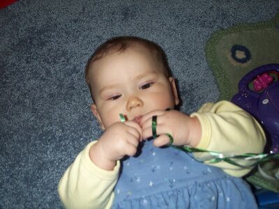 Me in the blue dress playing with ribbons close up