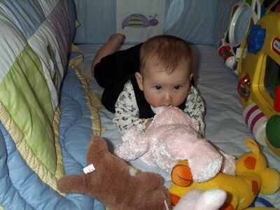 Me playing in crib