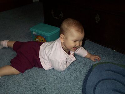 Me crawling and smiling