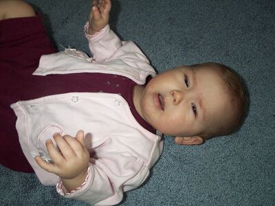 Me in pink outfit looking tired