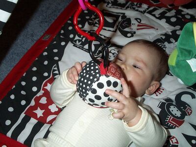 Me in striped outfit on playgym