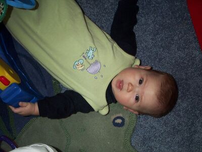 Me in green frog outfit limlim face