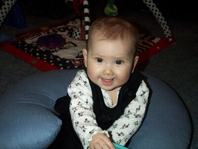 Me in black outfit smiling (one of Mommy and Daddy's favorites)