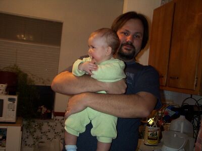 Daddy holding me